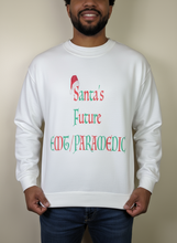 Load image into Gallery viewer, Santa’s Future EMT/ Paramedic   Long Sleeve Shirt